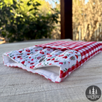 Cupid’s Picnic Medium Book Sleeve