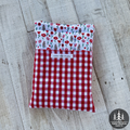 Cupid’s Picnic Medium Book Sleeve